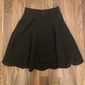 Black skirt. Flower design on bottom